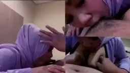 Sepongan Tante Jilbab Ungu Video by TXXX
